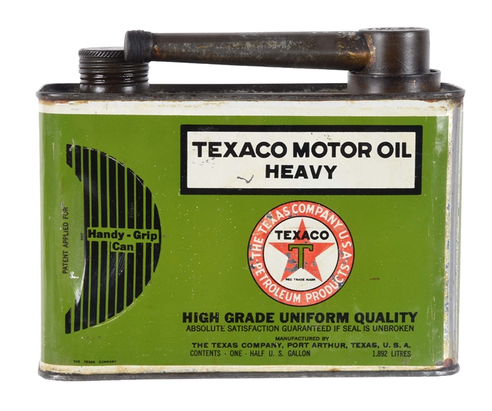 TEXACO HEAVY MOTOR OIL HALF GALLON CAN WITH HANDY GRIP.