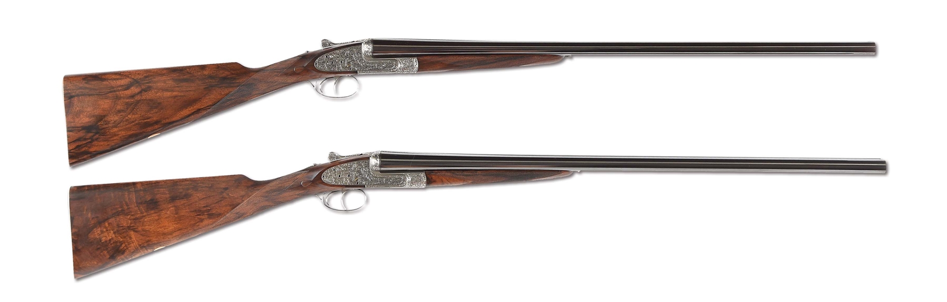 (M) MATCHED PAIR OF HOLLAND & HOLLAND "ROYAL DELUXE" SIDELOCK EJECTOR SELF-OPENING GAME GUNS ENGRAVED BY GEOFFREY CASBARD MADE FOR THE GAME CONSERVANCY IN 1979 IN THEIR MOTOR CASE WITH ACCESSORIES 