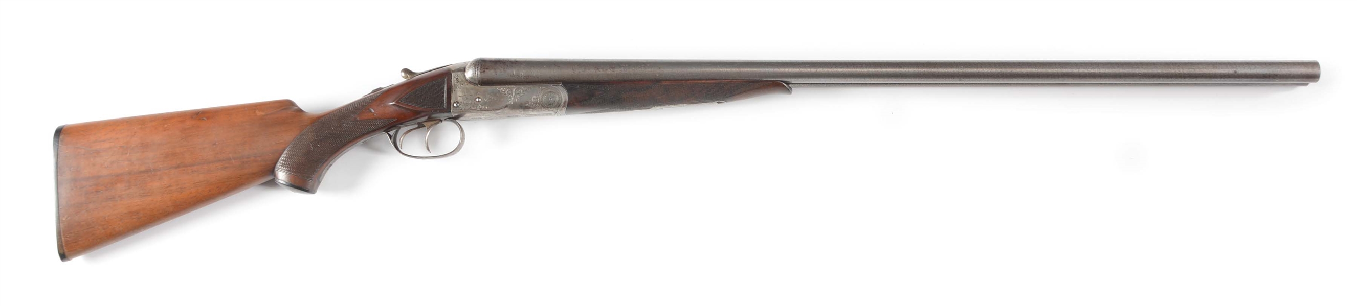 (A) COLT MODEL 1883 HAMMERLESS SHOTGUN WITH FINE SCROLL AND DOG SCENE ENGRAVING.