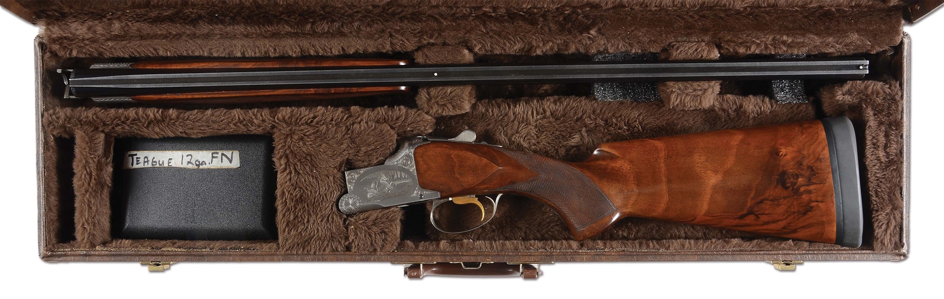 (C) FN BROWNING SUPERPOSED B2G OVER-UNDER TARGET SHOTGUN WITH CASE AND CHOKES.