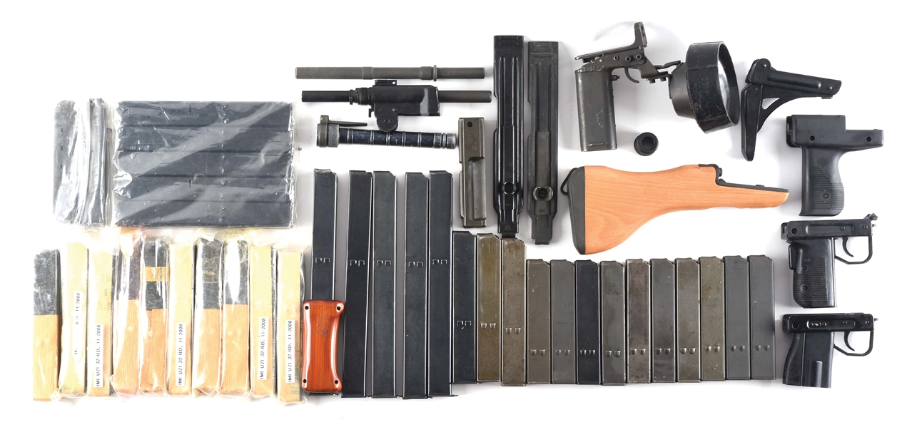 VAST GROUPING OF UZI MACHINE GUN MAGAZINES AND OTHER DESIRABLE SPARE PARTS.