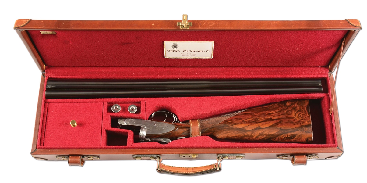 (M) SUBLIME ROUND BODIED, SIDELOCK EJECTOR, DOUBLE TRIGGER DESENZANI GAME GUN WITH INTRICATELY DETAILED WESTERN HUNTING SCENES BY GALEAZZI WITH CASE.