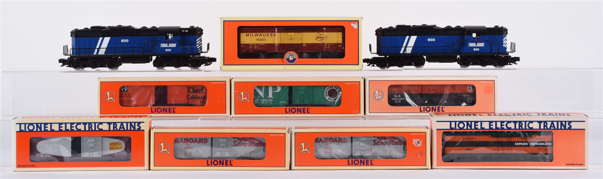 LOT OF 10: LIONEL LOCOMOTIVES & ROLLING STOCK IN BOXES. 