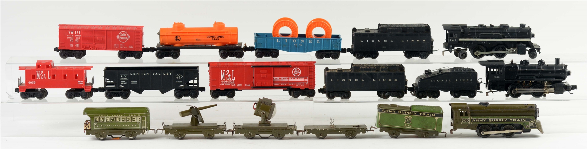 LOT OF 11: LIONEL & MARX LOCOMOTIVES AND ROLLING STOCK.
