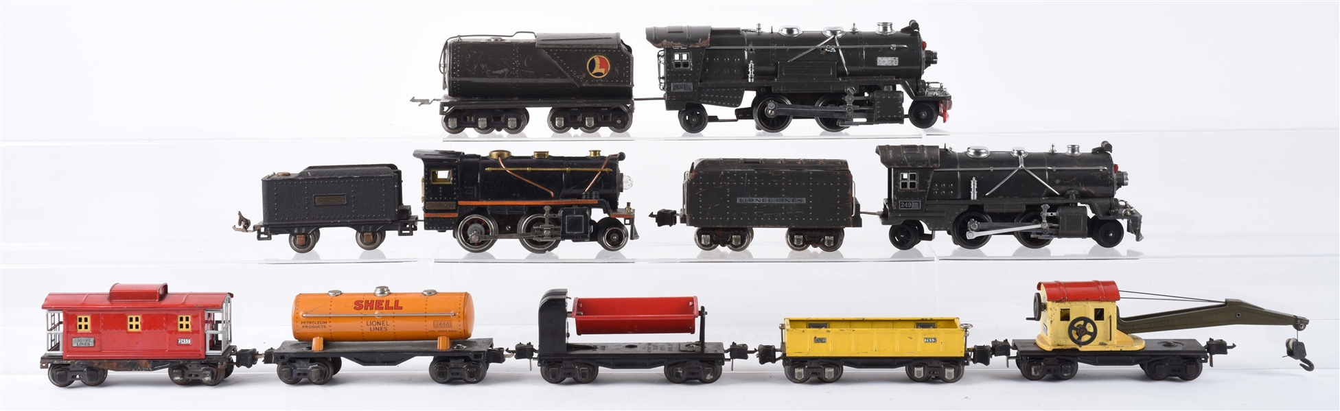 LOT OF 11: LIONEL LOCOMOTIVES & FREIGHT CARS. 