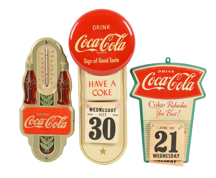 LOT OF 3: COCA-COLA ADVERTISING CALENDAR SIGNS AND THERMOMETER.