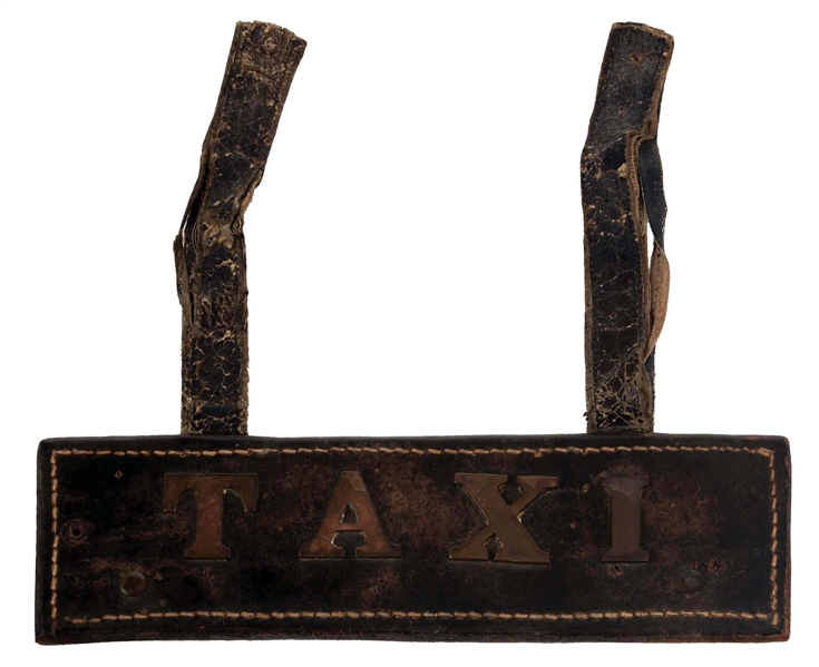 LEATHER TAXI LICENSE PLATE.
