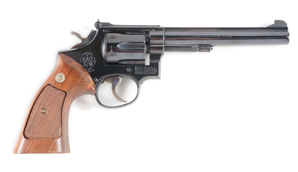 (C) SMITH AND WESSON K-22 DOUBLE ACTION REVOLVER.