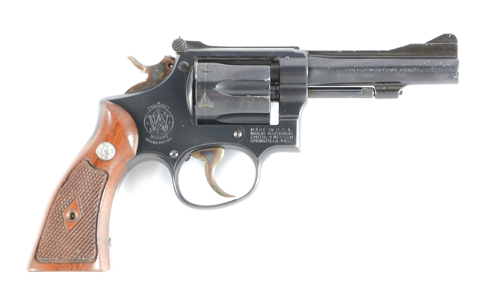 (C) SMITH AND WESSON .38 COMBAT MASTERPIECE DOUBLE ACTION REVOLVER.