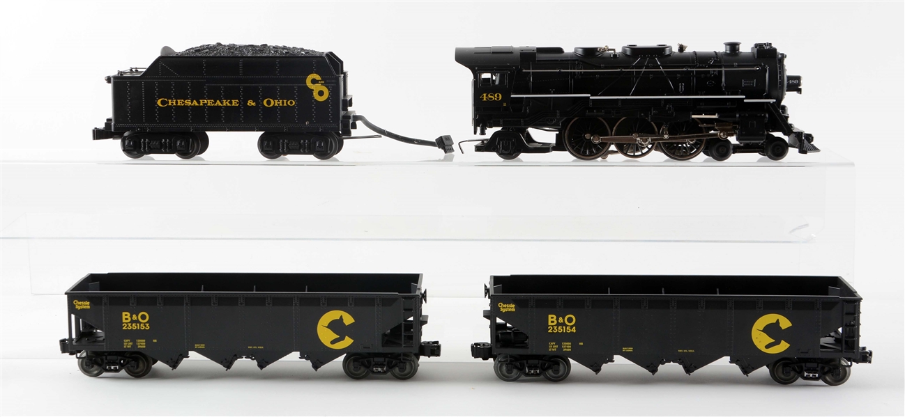 LOT OF 2: LIONEL C &O PACIFIC LOCOMOTIVE AND HOPPER CARS.