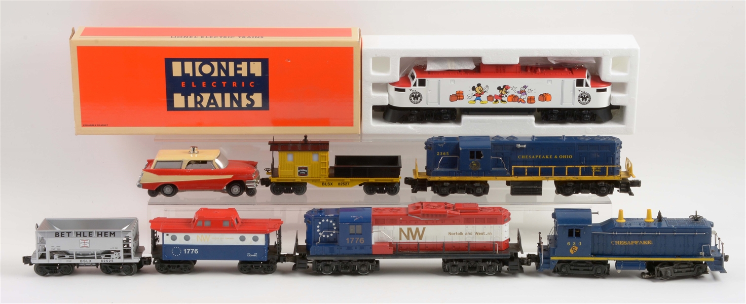 LOT OF 8: LIONEL LOCOMOTIVES AND ROLLING STOCK.  