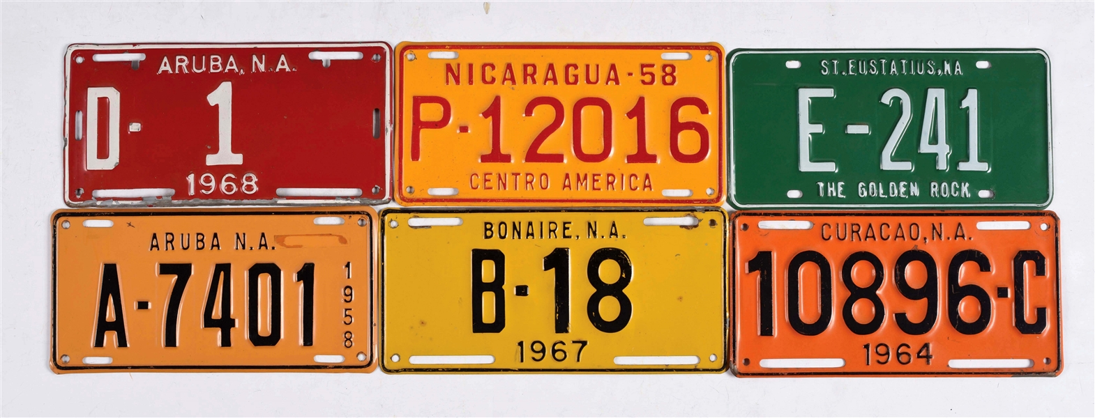 LOT OF 12: CARRIBEAN LICENSE PLATES.