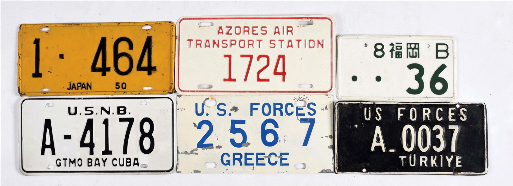 LOT OF 11: U.S. FORCES ABROAD LICENSE PLATES.