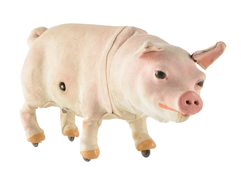FRENCH MECHANICAL WIND UP LEATHER COVERED PIG.