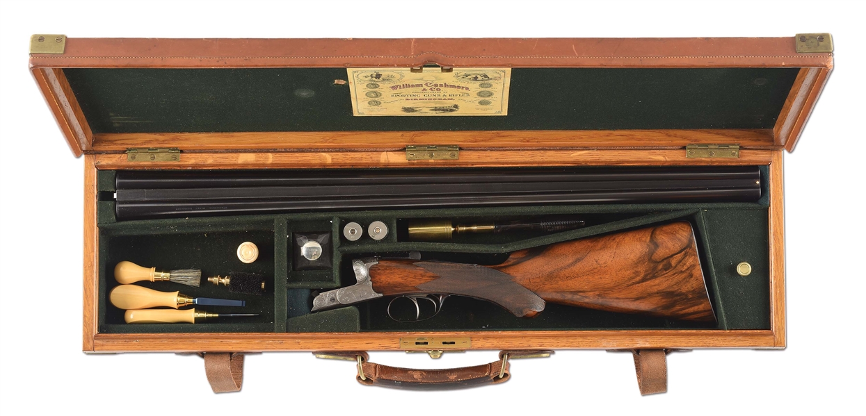 (C) VERY RARE WILLIAM CASHMORE HAND DETACHABLE TRIGGER PLATE ACTION EJECTOR SIDE BY SIDE PIGEON SHOTGUN WITH CASE AND ACCESSORIES.