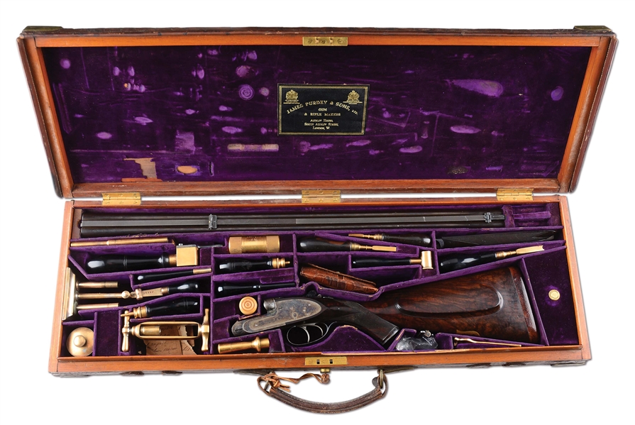 (A) SUPERB, HIGH ORIGINAL CONDITION JAMES PURDEY HAMMERLESS SIDELOCK MEDIUM GAME DOUBLE RIFLE MADE FOR THE MAHARAJ RANA OF DHOLPUR WITH ORIGINAL CASE AND A MYRIAD OF GOLD PLATED ORIGINAL ACCESSORIES.