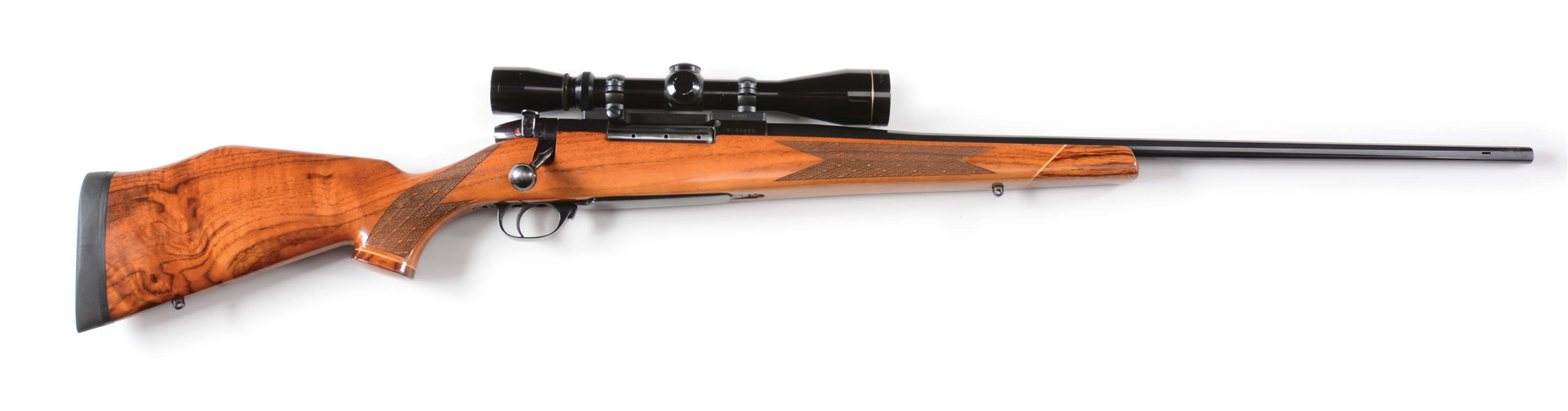 (M) WEATHERBY MARK V BOLT ACTION RIFLE WITH LEUPOLD SCOPE, CALIBER .340 WEATHERBY MAGNUM.
