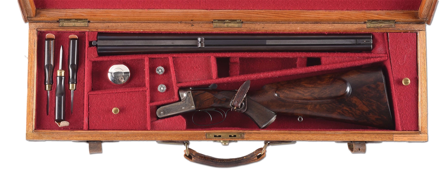 (A) BEAUTIFUL CASED J. PURDEY BOXLOCK SIDE BY SIDE RIFLE IN .45-70 CALIBER.