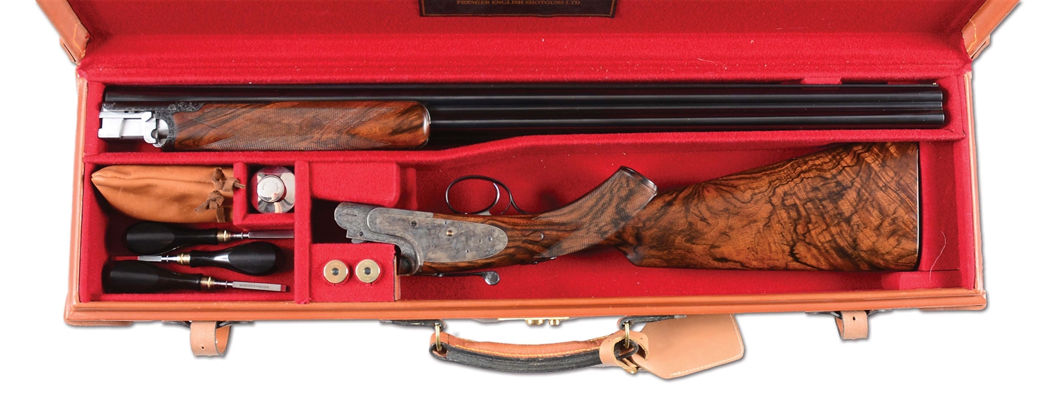 (M) THE VERY FIRST NEW PRODUCTION HOLLOWAY & NAUGHTON OVER/UNDER 20 BORE SIDELOCK EJECTOR, SINGLE TRIGGER SHOTGUN ENGRAVED BY BRIAN WISEMAN WITH CASE.