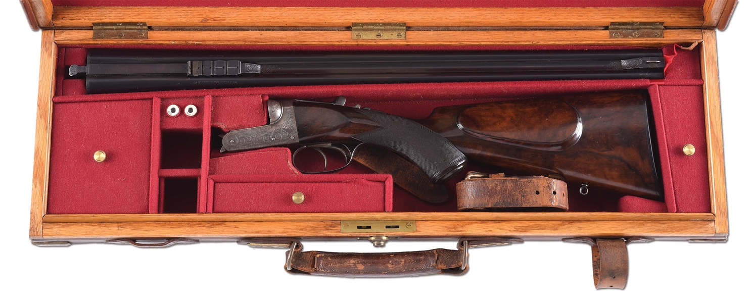 (C) CASED WESTLEY RICHARDS DOUBLE RIFLE IN .405 CALIBER (1912).