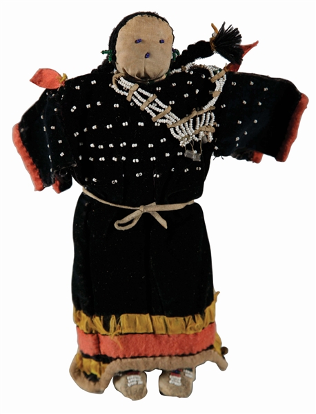 SIOUX INDIAN DOLL WITH VELVET DRESS.