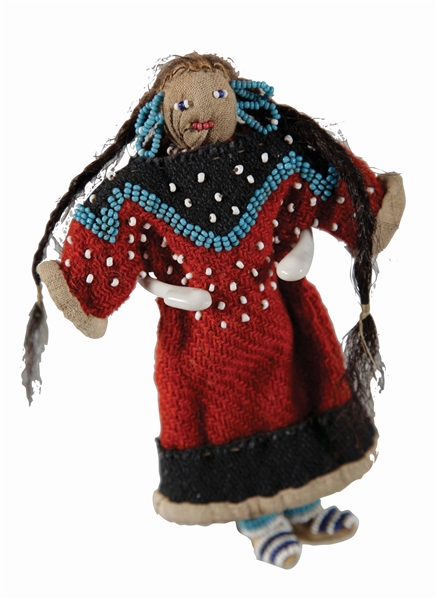 CROW INDIAN FEMALE DOLL.
