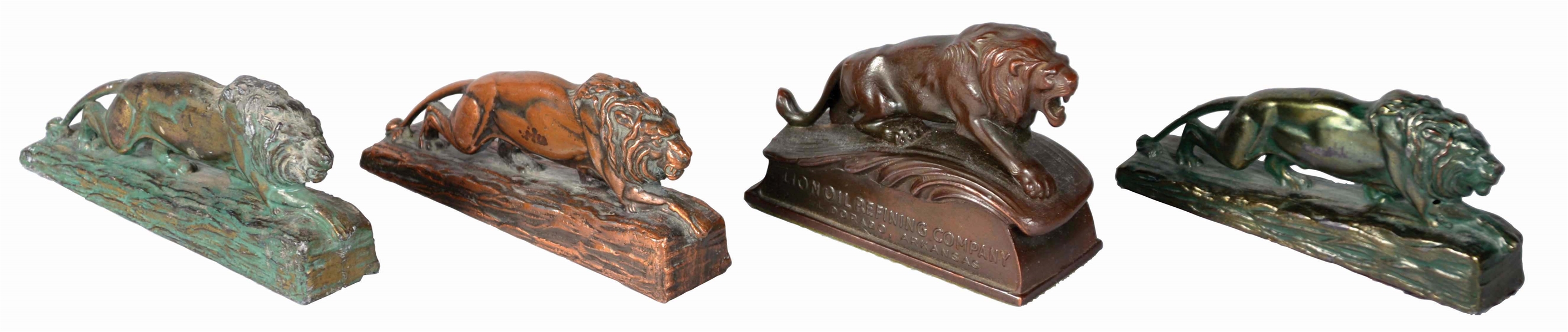 LOT OF 4: LION ADVERTISING FIGURINES. 