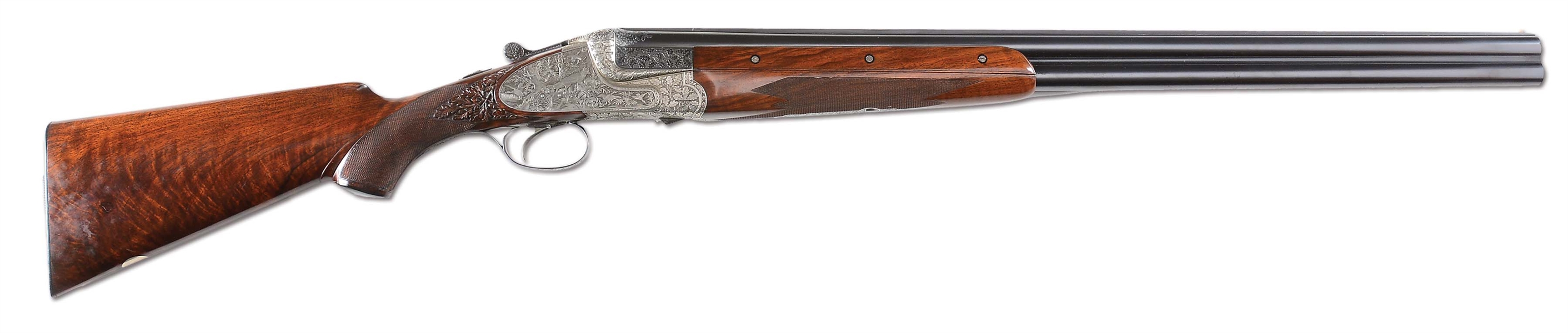 (C) HIGH ORIGINAL CONDITION MERKEL 203E OVER / UNDER SHOTGUN WITH FINE RELIEF ENGRAVING AND ATTRACTIVE OAK LEAF CARVING ON STOCK.