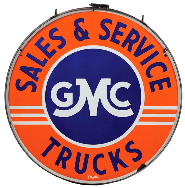 GMC TRUCKS SALES & SERVICE PORCELAIN SIGN WITH METAL RING. 