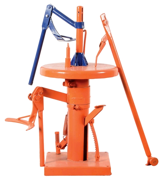 METAL TIRE CHANGING MACHINE RESTORED IN GULF GASOLINE COLORS.