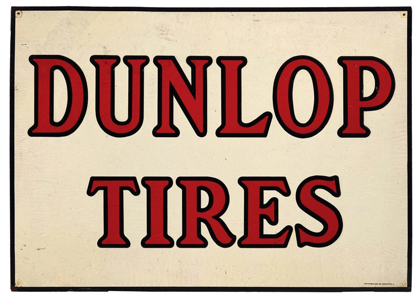 DUNLOP TIRES EMBOSSED TIN SIGN.