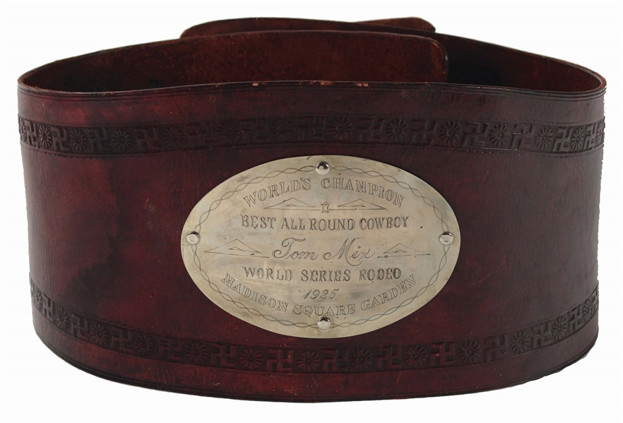 1925 TOM MIX WORLD SERIES RODEO CHAMPION LEATHER BRONC BELT WITH LARGE SILVER AWARD PLAQUE.