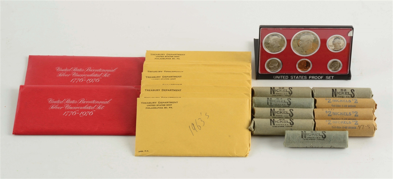 LOT WITH 9 ROLLS OF NICKELS & 15 PROOF SETS. 