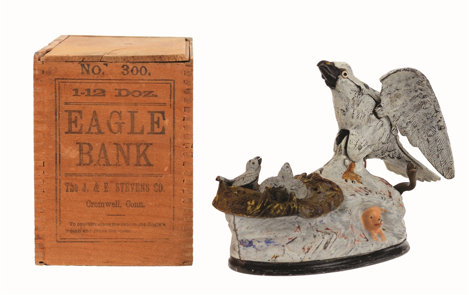 J. & E. STEVENS EAGLE & EAGLETS CAST-IRON MECHANICAL BANK. 