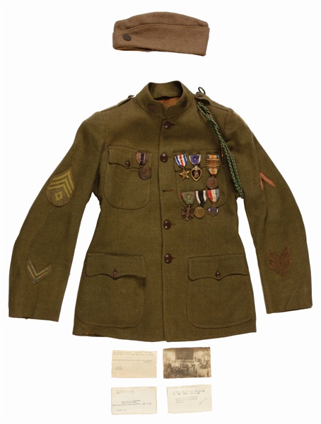 WWI IDENTIFIED FIRST DIVISION UNIFORM AND SILVER STAR, PURPLE HEART GROUP.