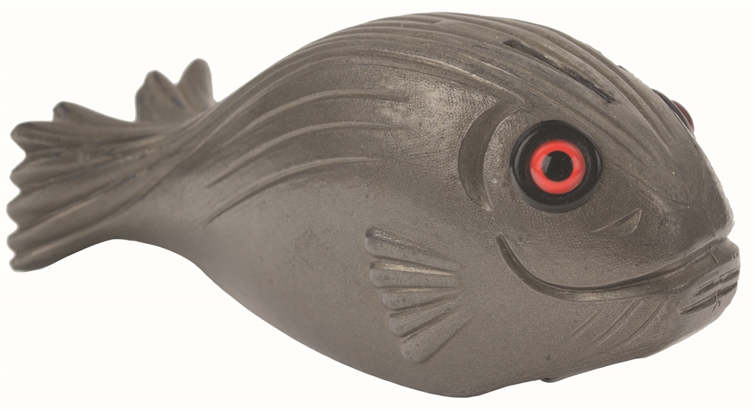 CAST LEAD FISH BANK WITH KEY, TRAP AND GLASS EYES. 