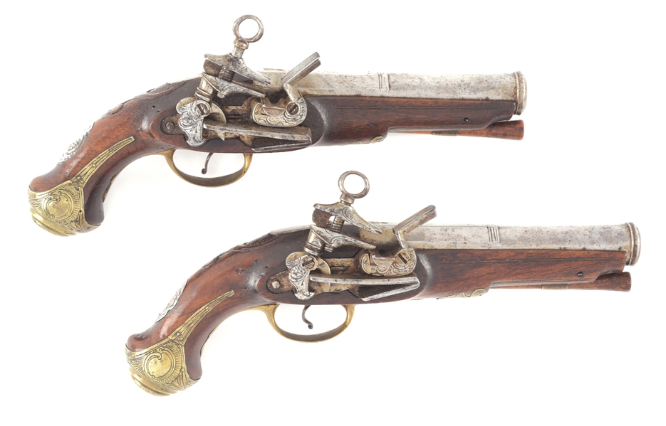 (A) AN ATTRACTIVE PAIR OF SPANISH MIQUELET BELT PISTOLS BY VANET, SIGNED ON FRIZZEN, WITH BARRELS BY JOAN PRAT, CIRCA 1800.