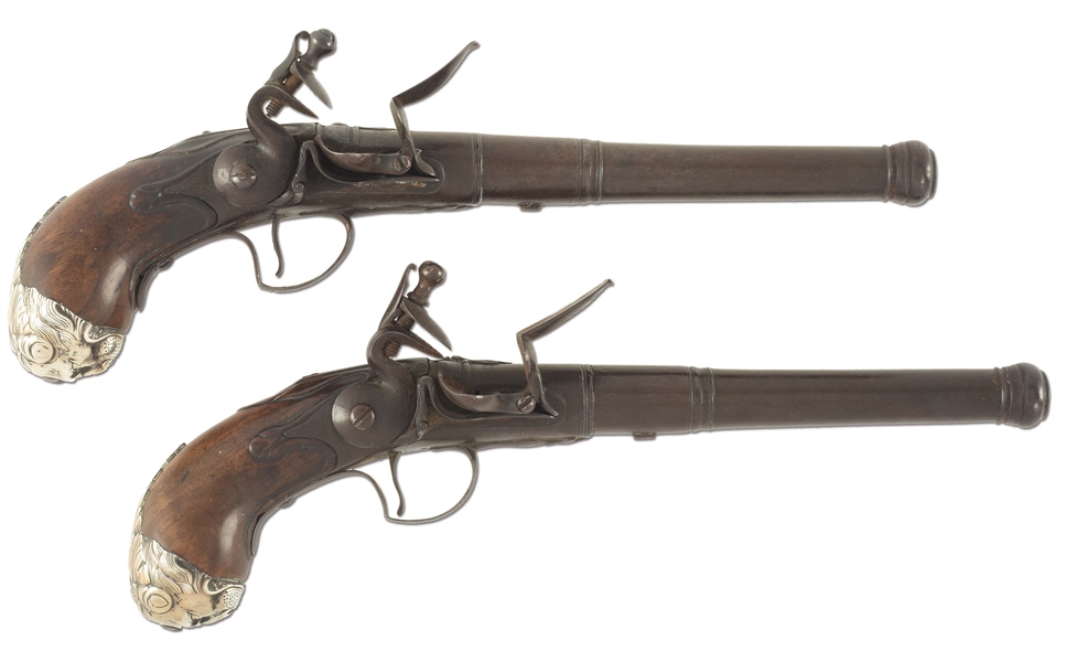 (A) AN EXTREMELY RARE AND POSSIBLY UNIQUE PAIR OF TRUE QUEEN ANNE FLINTLOCK PISTOLS, CIRCA 1710, BY JOHN BRUSH, 1703-1726, IN UNTOUCHED ORIGINAL CONDITION THROUGHOUT.