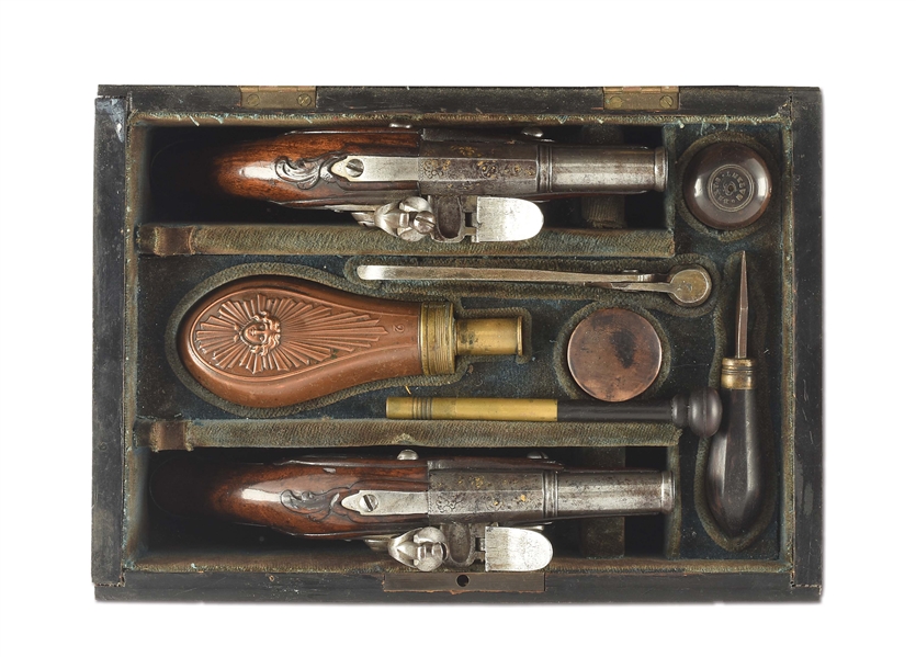 (A) CASED DIMINUTIVE PAIR OF CONTINENTAL FLINTLOCK POCKET PISTOLS WITH ENGRAVED SIDELOCKS, SPURRED BUTTCAPS, AND SCRATCH RIFLED BARRELS.