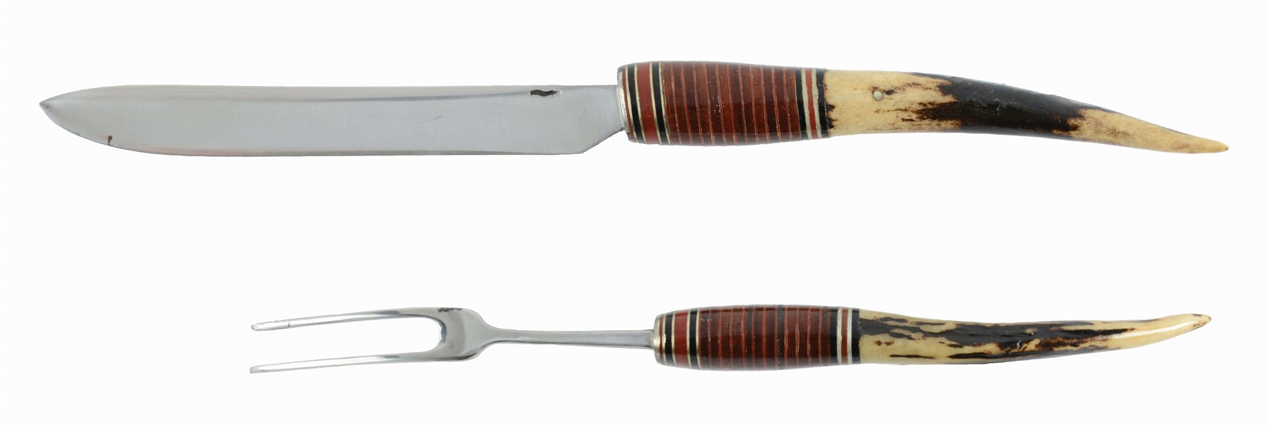 ELEGANT WILLIAM "BILL" SCAGEL TABLE SIZED TWO-PIECE CARVING SET WITH STAG HANDLES.