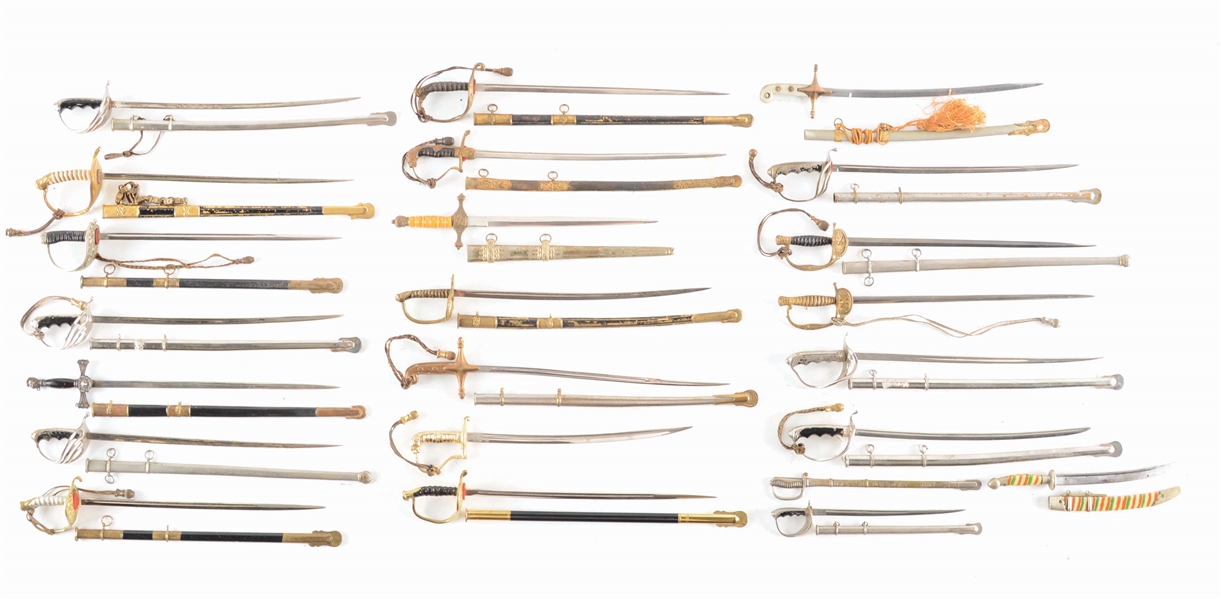 LOT OF 23: VINTAGE MILITARY MINIATURE SWORDS & SCABBARDS.