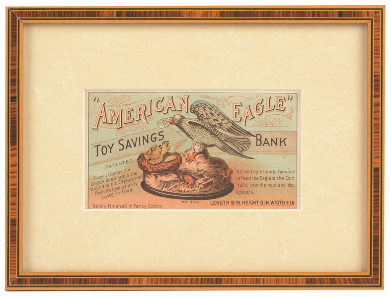 FRAMED AMERICAN EAGLE AND EAGLETS MECHANICAL BANK TRADE CARD.