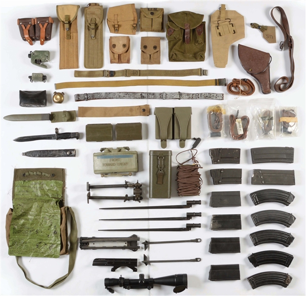 LARGE LOT OF MISCELLANEOUS MILITARY WEAPONS RELATED GEAR.