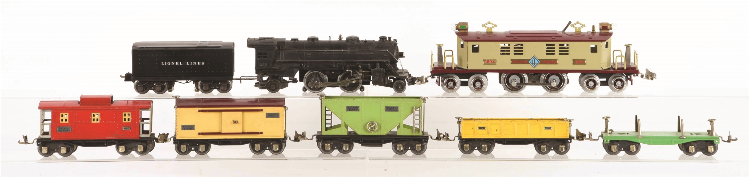 LOT OF 7: IVES REPRO NO. 1694 LOCOMOTIVE WITH ORIGINAL LIONEL NO. 229 & 600 SERIES FREIGHTS. 