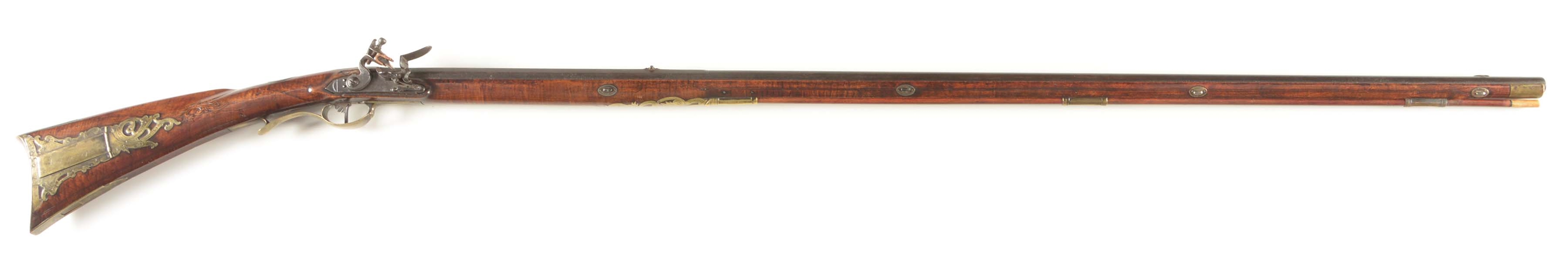(A) RELIEF CARVED AND ORNATE FLINTLOCK KENTUCKY RIFLE SIGNED JOHN YOUNG ON PATCHBOX AND BARREL.