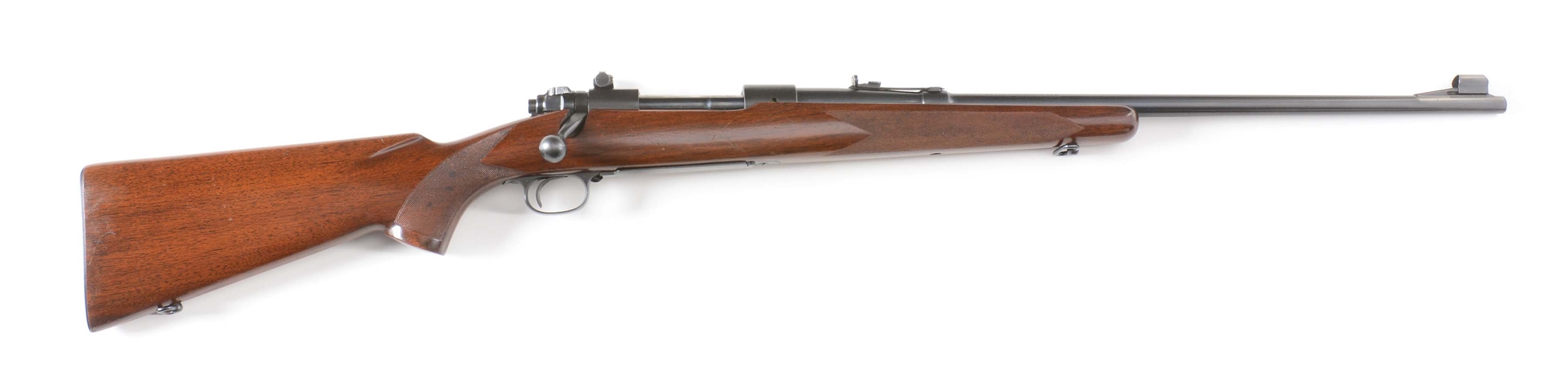 (C) WINCHESTER MODEL 70 BOLT ACTION RIFLE REFINISHED AND CONVERTED TO 7MM.