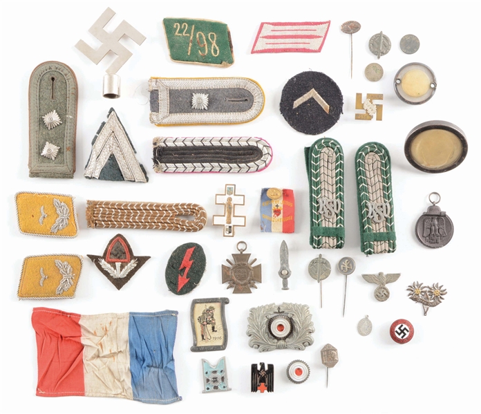LOT OF 40: THIRD REICH INSIGNIA, MEDALS, AND PINS.