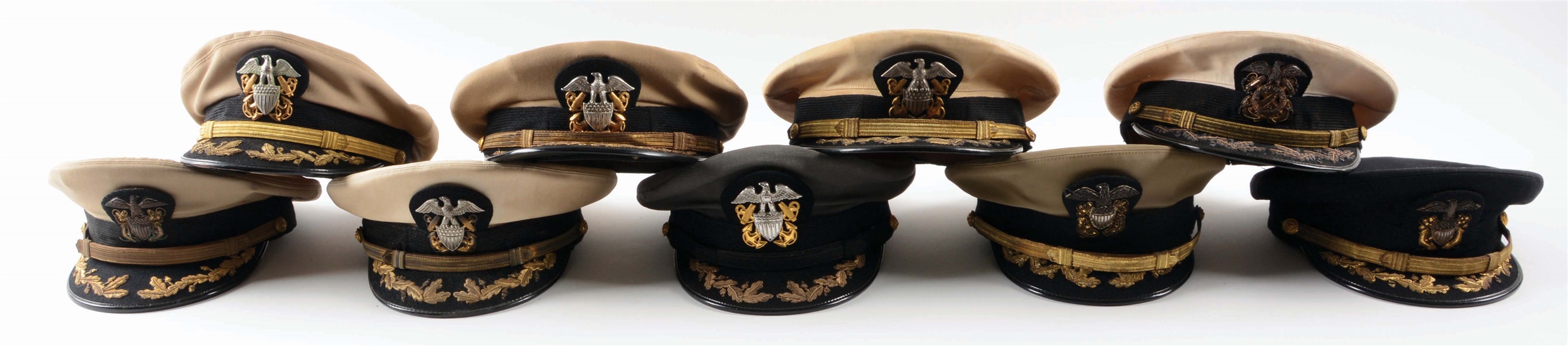 LOT OF 9: US NAVY OFFICER CAPS.