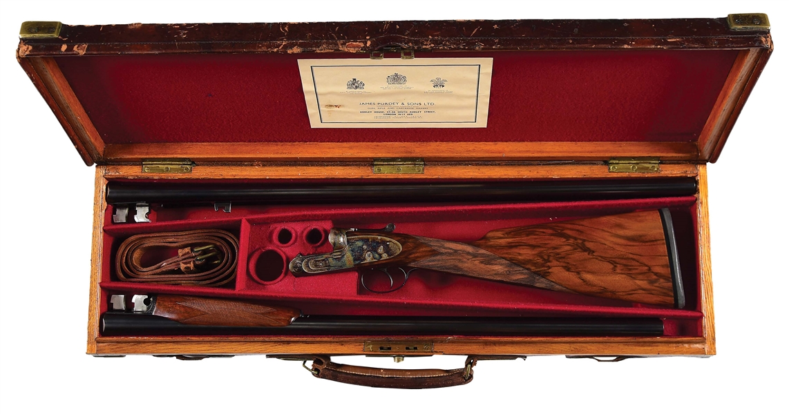 (C) JAMES PURDEY HEAVY PROOF SIDELOCK SINGLE TRIGGER PIGEON SHOTGUN WITH TWO SETS OF BARRELS AND CASE.