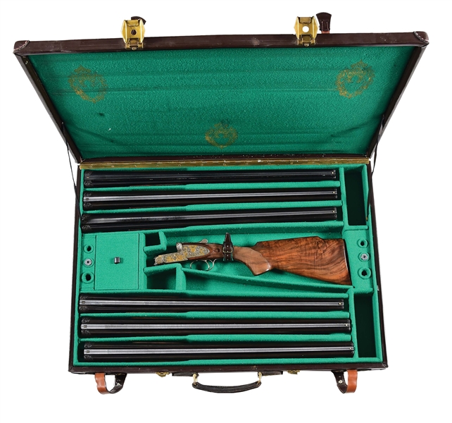 (M) UNIQUE AND IMPRESSIVE SMALL GAUGE SIDELOCK EJECTOR SIX BARREL SET GAME GUN BY FAMARS WITH EXCEPTIONAL RELIEF SCROLL AND BULINO GOLD INLAY OF CLASSICAL THEME  BY ANGELO GALEAZZI WITH CASE. 